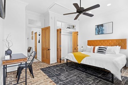 Super spacious bedroom 1 w/ a huge closet & dedicated desk for working in comfort.