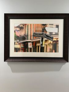 Local artwork adds a touch of New Orleans character to the space.