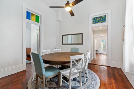 Dining area w/ a round table that seats eight — ideal for shared meals & good conversation.