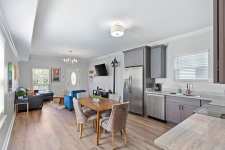 Kitchen & living room flow together — ideal for easy entertaining.