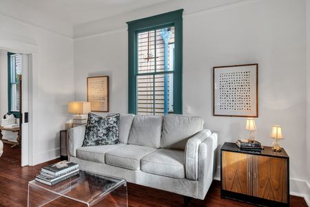 Bright, welcoming living room w/ cozy seating & beautiful natural light.