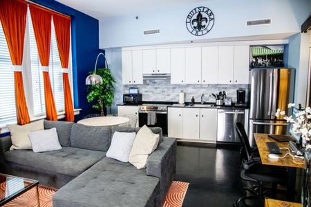 Bright, open kitchen & living area — everything you need for a comfortable stay.