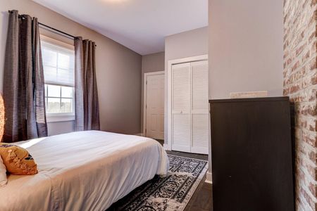 Soft, neutral bedroom w/ a relaxed, restful vibe.