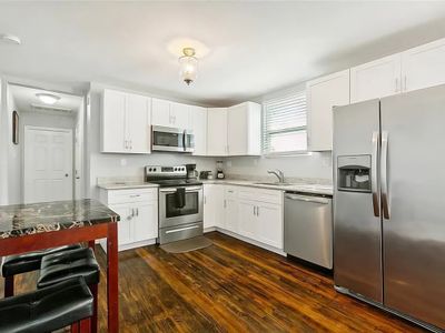 Fully equipped kitchen—perfect for relaxing or cooking up a delicious meal after a day in NOLA!