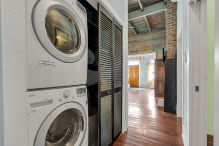Stacked washer & dryer tucked away — laundry made easy during your stay.
