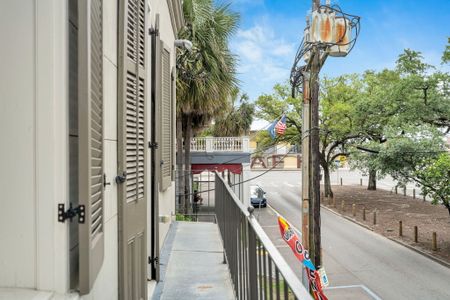 Enjoy a peaceful street view and a touch of New Orleans charm right from your private balcony.