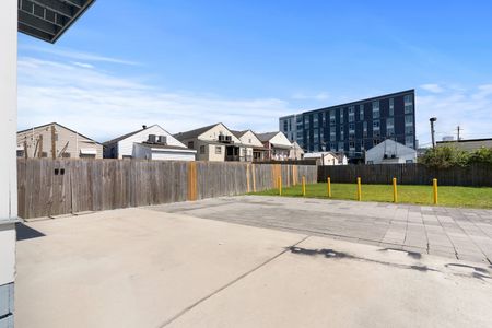 Large parking lot behind the building — easy in, easy out for the whole group.