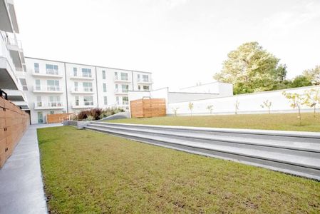 Manicured grounds & open green space right outside your door.