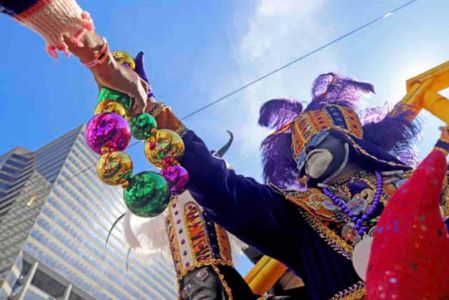 Catch the dazzling spirit of NOLA's parade culture right outside your door.