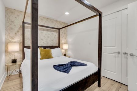 Recharge in a dreamy French Quarter bedroom where vintage charm meets modern comfort.