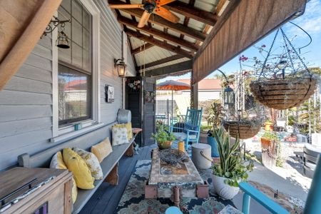 Covered porch made for slow mornings & quiet evenings.