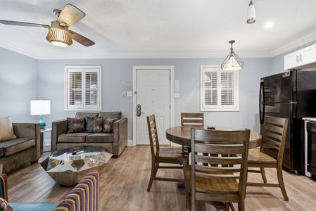 Bright & airy gathering space w/ natural light & room to lounge or dine.