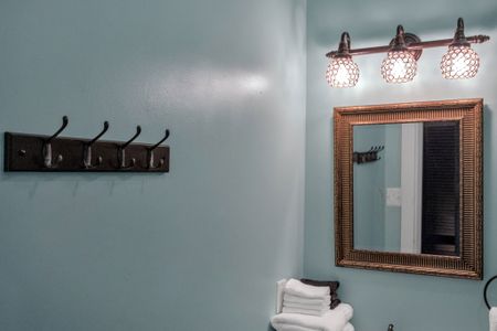 Entryway w/ handy coat hooks to settle in the moment you arrive.