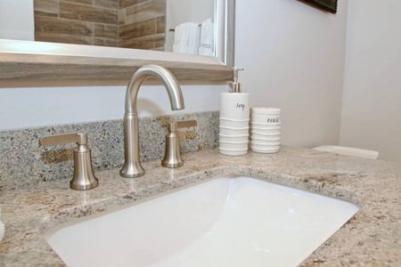 Polished silver fixtures & a deep sink — ready for your morning routine.