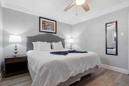 Crisp, cozy bed dressed in fresh white linens