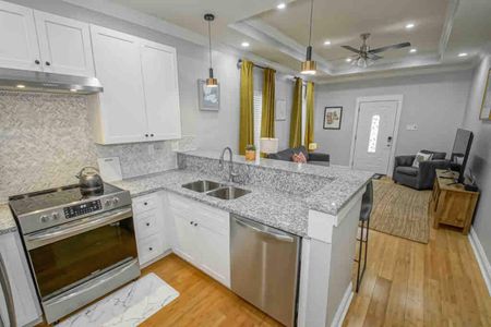Fully stocked kitchen w/ dinnerware, glasses, & utensils — ready for any meal.