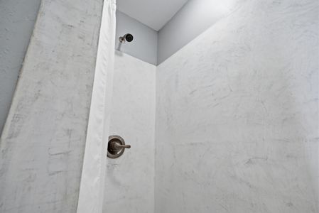Textured wall detail adding character & warmth to the space.