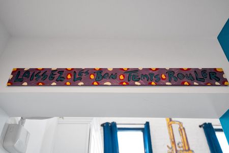 Glowing Mardi Gras bead arrangement adds a festive, one-of-a-kind local touch.