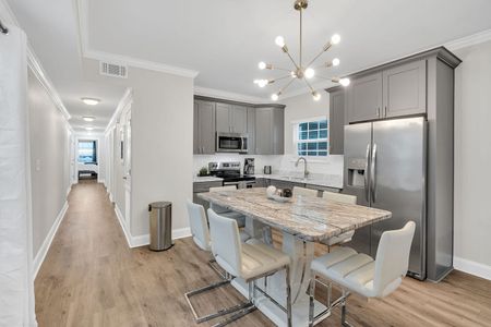 Sleek, fully equipped kitchen ready for home-cooked meals.