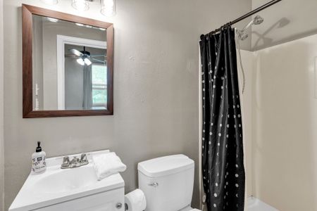 Fresh bathroom w/ a sink & natural light for a clean, easy start to your day.