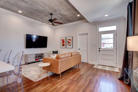 Kick back in the living room w/ a large flat-screen TV — Netflix nights sorted.