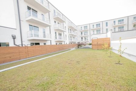 Well-kept exterior w/ lush lawn — a welcoming community setting.