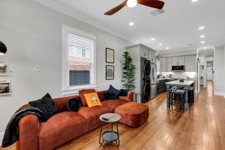 Open, flowing layout connects the cozy living room to the kitchen so everyone stays together