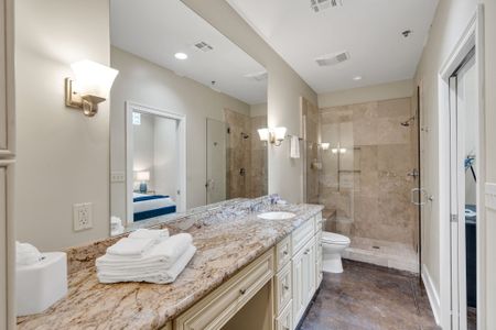 Spa-style bath with dual vanity and walk-in shower
