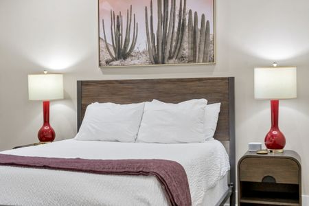 Rustic wood headboard under landscape art