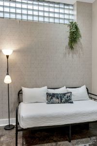 Lounge-worthy daybed with soft textured walls