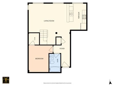 First floor layout with living, kitchen, and laundry