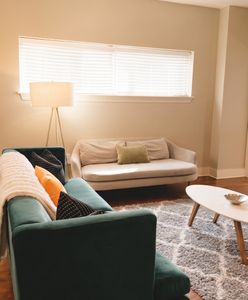 Living room w/ comfortable seating & natural light