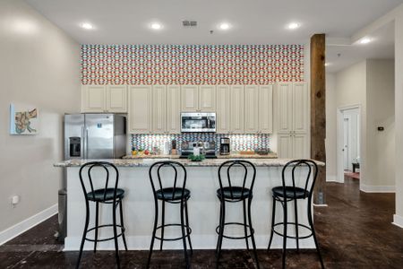 Bistro stools lined up at the breakfast bar