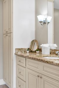 Tissues, towels, and granite at the sink