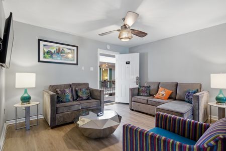 Airy living room w/ a welcoming layout right from the entryway.