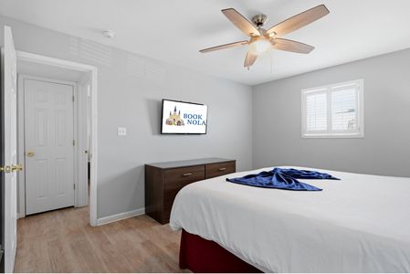 Cozy king bedroom with smart TV