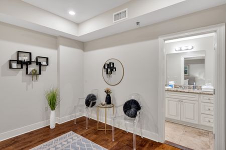 Chic landing with velvet seating and mirror decor
