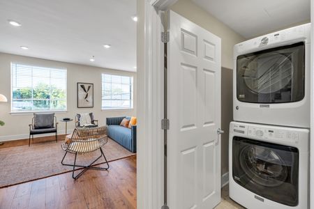 Peek downstairs with in-unit washer and dryer