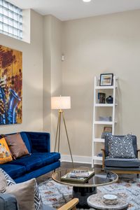 Reading lamp, cozy chair, good book