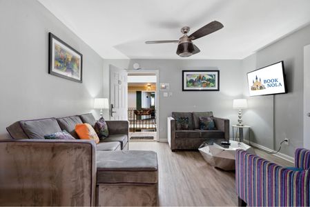 Unit 307 – Bright living space w/ comfy seating & a smart TV to unwind.