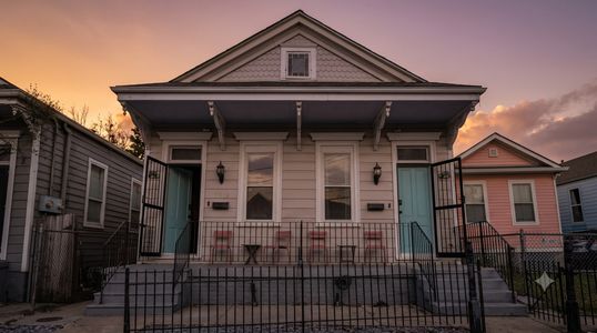 The home's inviting exterior w/ a welcoming front porch.