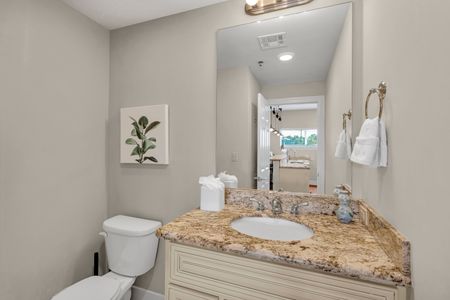 Fresh vanity with botanical wall art