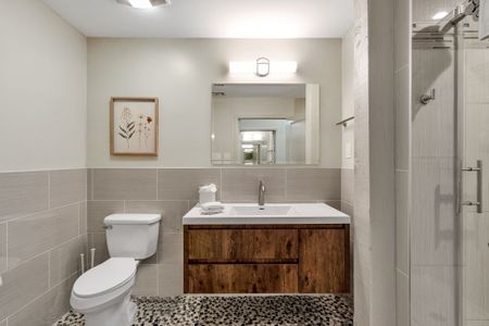 Warm wood vanity with clean modern lines