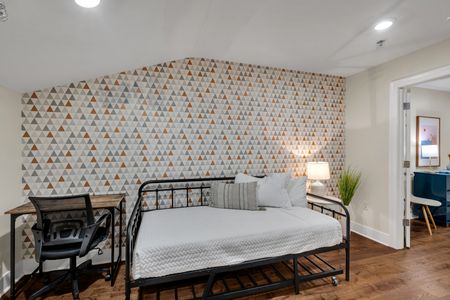 Daybed nook against a statement patterned wall