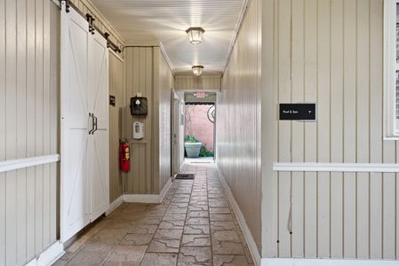 Corridor to shared pool & spa