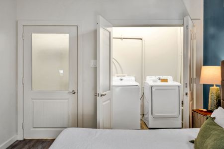 Full-size washer and dryer in their own room