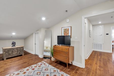 Full-length mirror and TV for getting ready