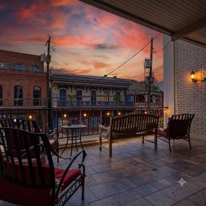 Balcony overlooking French Quarter vibes