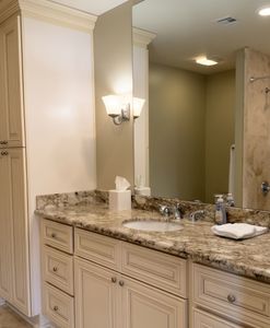 Bathroom w/ double vanity, granite counters & walk-in shower
