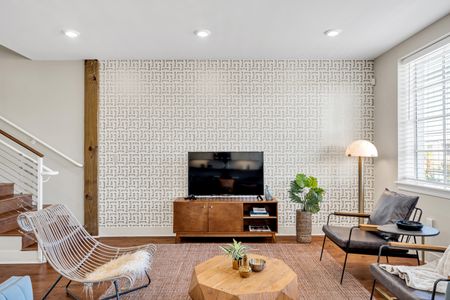 Smart TV framed by statement wallpaper